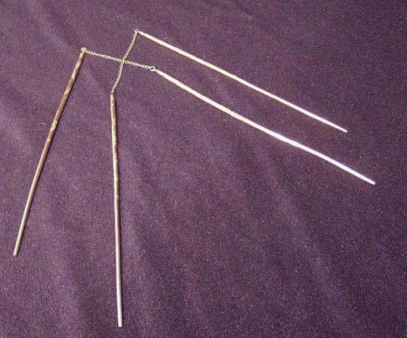 Two pair 999F Silver chopsticks attached at the tip by chains